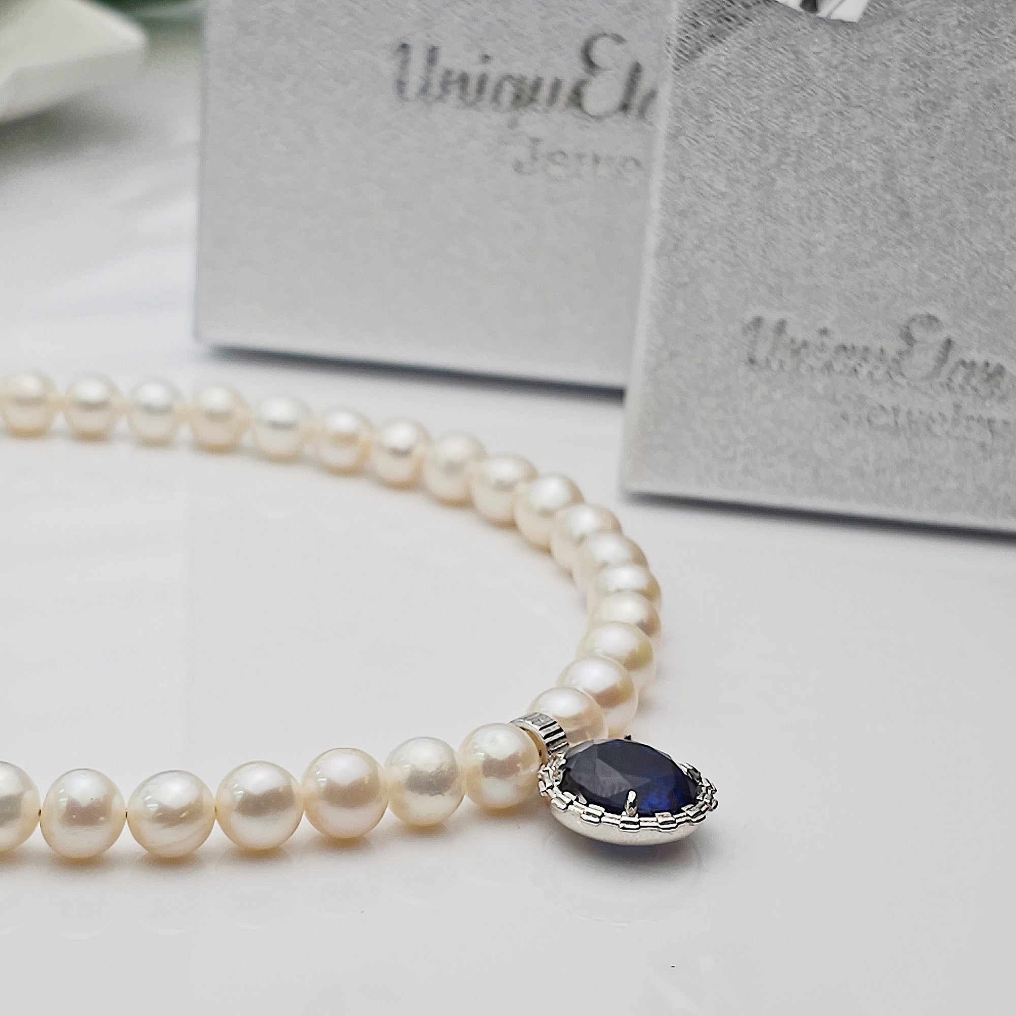 White Pearl and Sapphire Jewelry Set