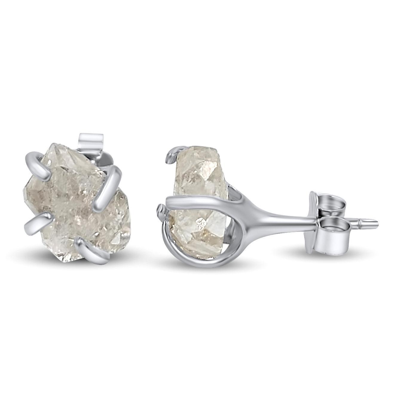 Buy Silver Plated Embellished Emerald Wildflower And Uncut Diamond Earrings  by The Alchemy Studio Online at Aza Fashions.